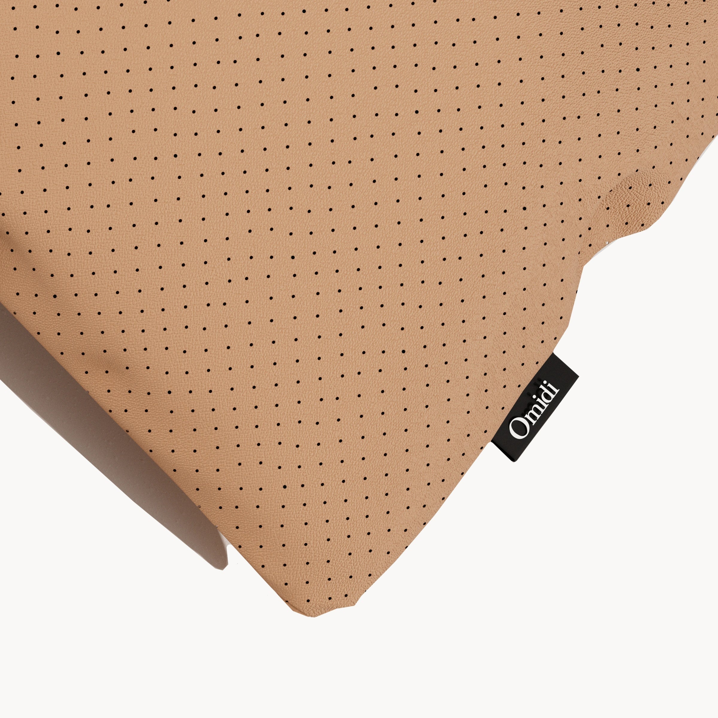 Burnt orange perforated leather cushion corner with Omidi tag
