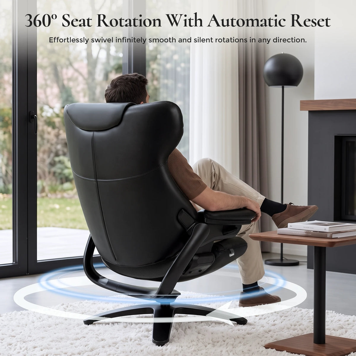 Black recliner lounge chair with matching ottoman, curved back and wide armrests