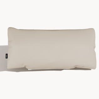 Cream full-grain leather cushion with smooth surface and side tag